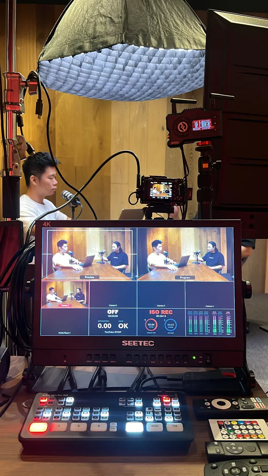 Behind the scenes as Adrian Ching records a conversation